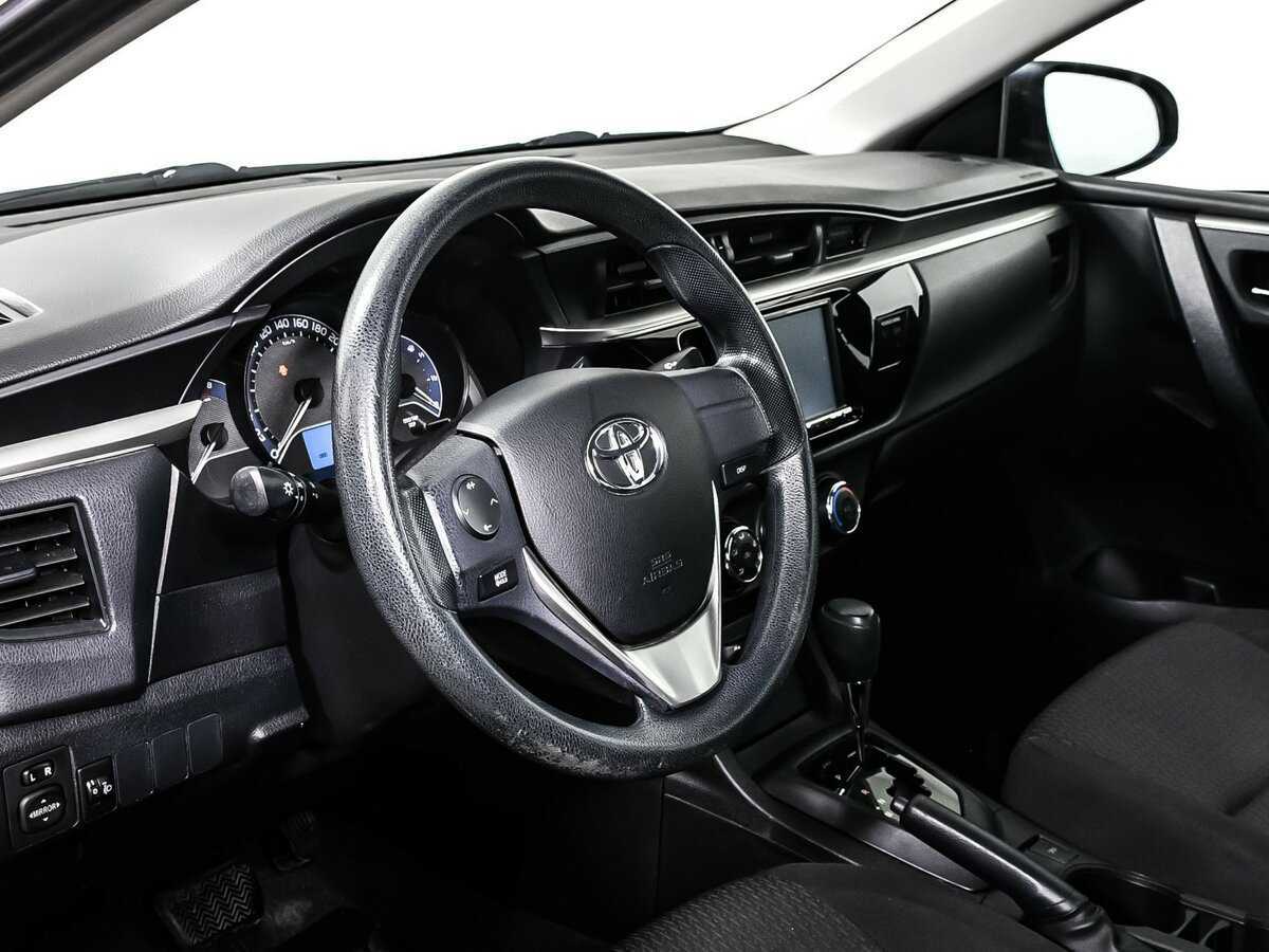 Купить Toyota Corolla с пробегом. Фото: #11