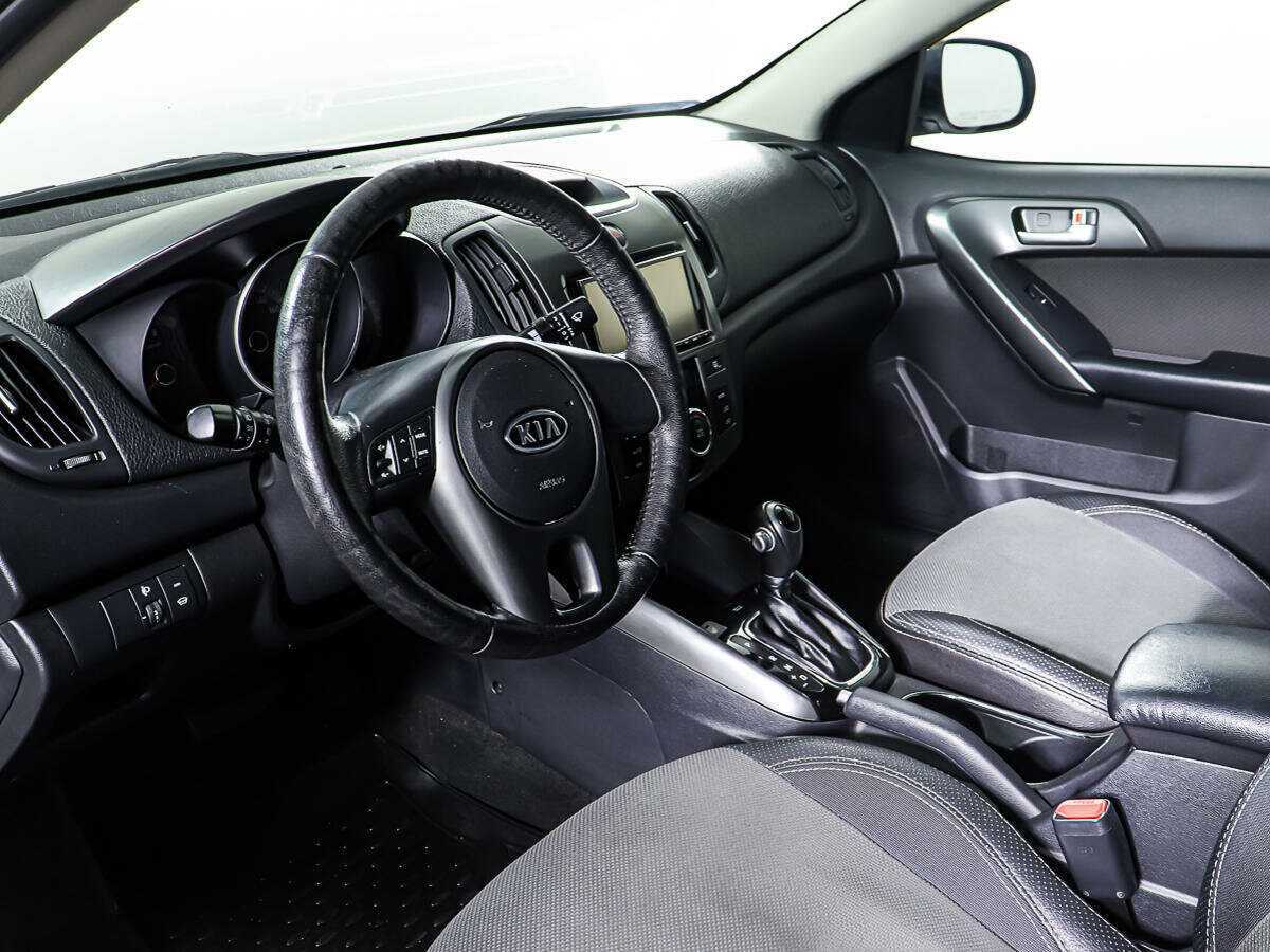 Купить Kia Cerato с пробегом. Фото: #14