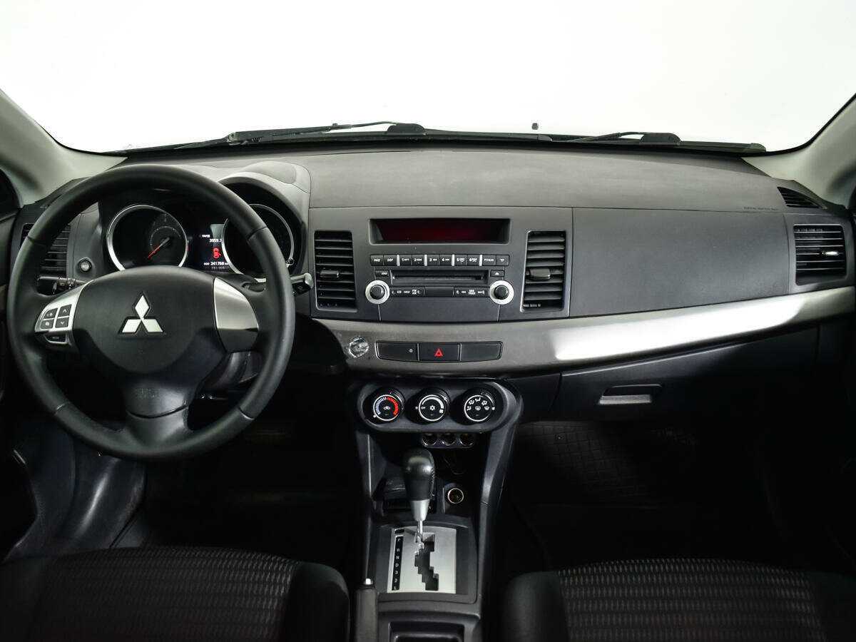 Купить Mitsubishi Lancer с пробегом. Фото: #11