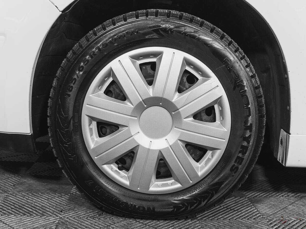 Купить Nissan Tiida с пробегом. Фото: #14