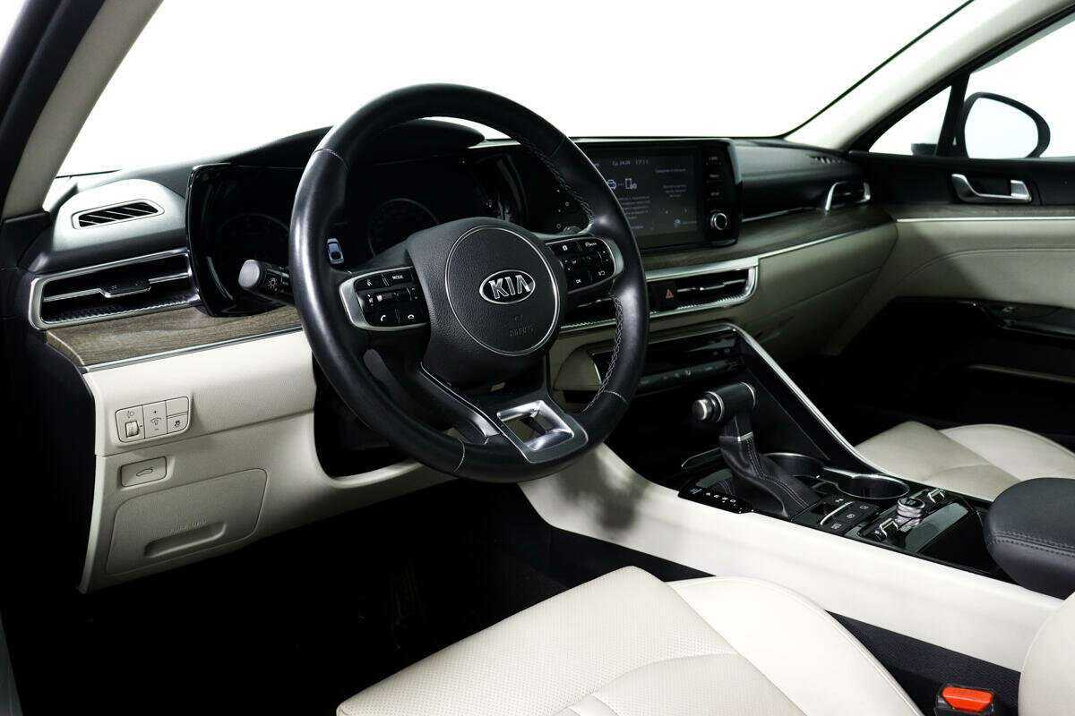 Купить Kia K5 с пробегом. Фото: #12