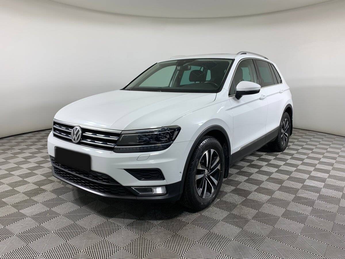 Купить Volkswagen Tiguan с пробегом. Посмотреть фото
