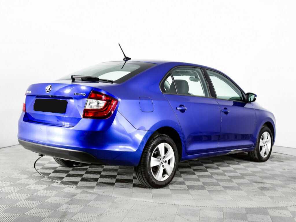 Купить Skoda Rapid с пробегом. Фото: #4