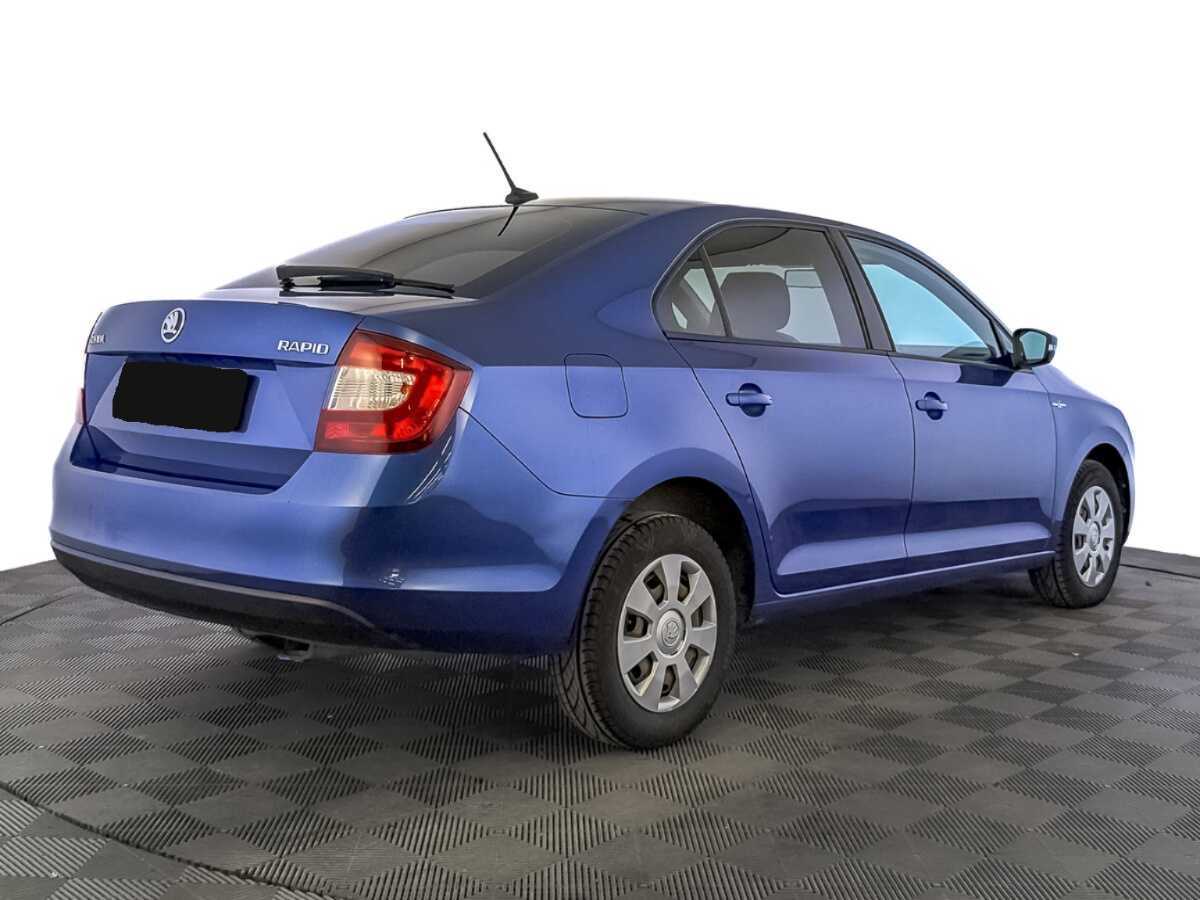 Купить Skoda Rapid с пробегом. Фото: #4