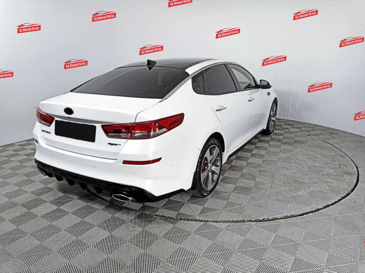 Купить Kia Optima с пробегом. Фото: #4