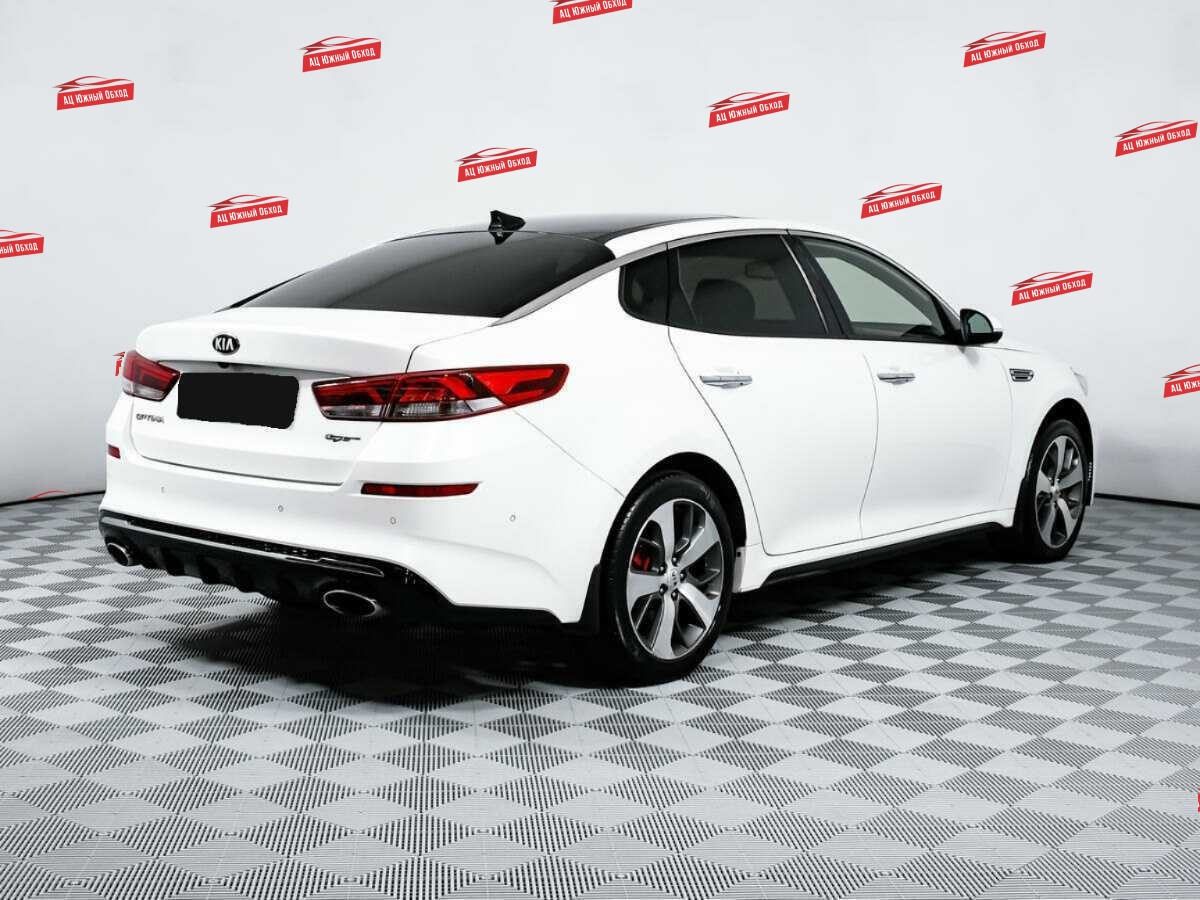 Купить Kia Optima с пробегом. Фото: #4