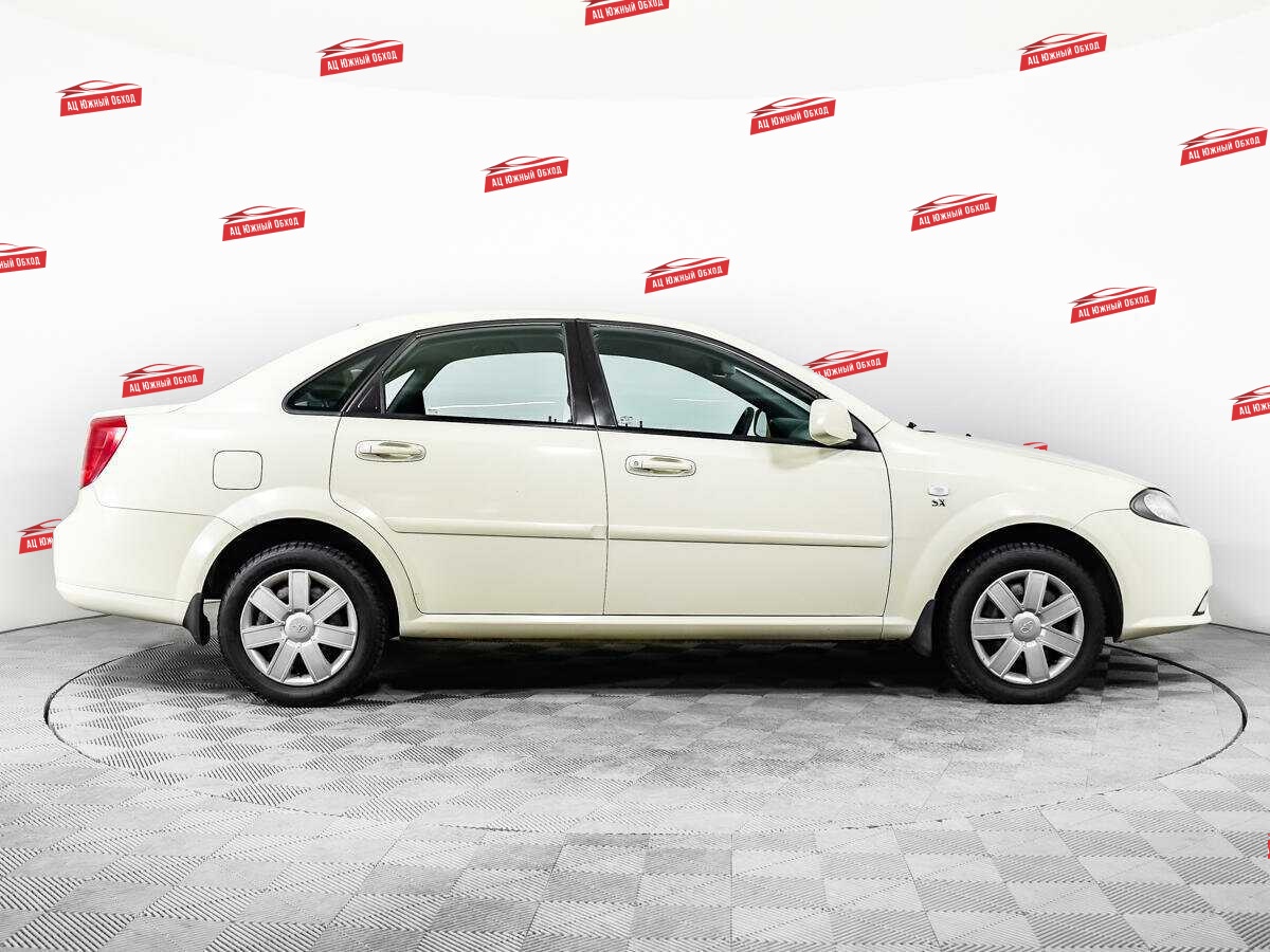 Купить Daewoo Gentra с пробегом. Фото: #3