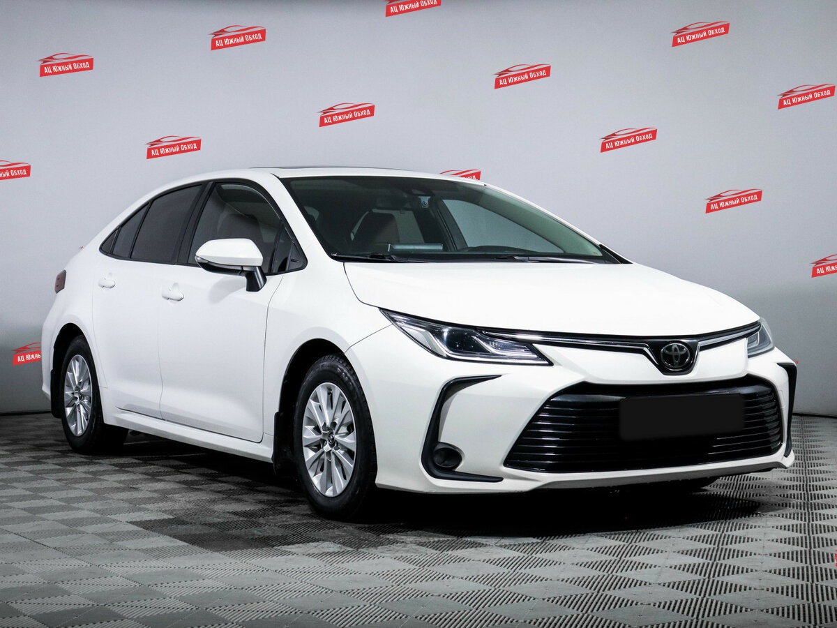 Купить Toyota Corolla с пробегом. Фото: #2