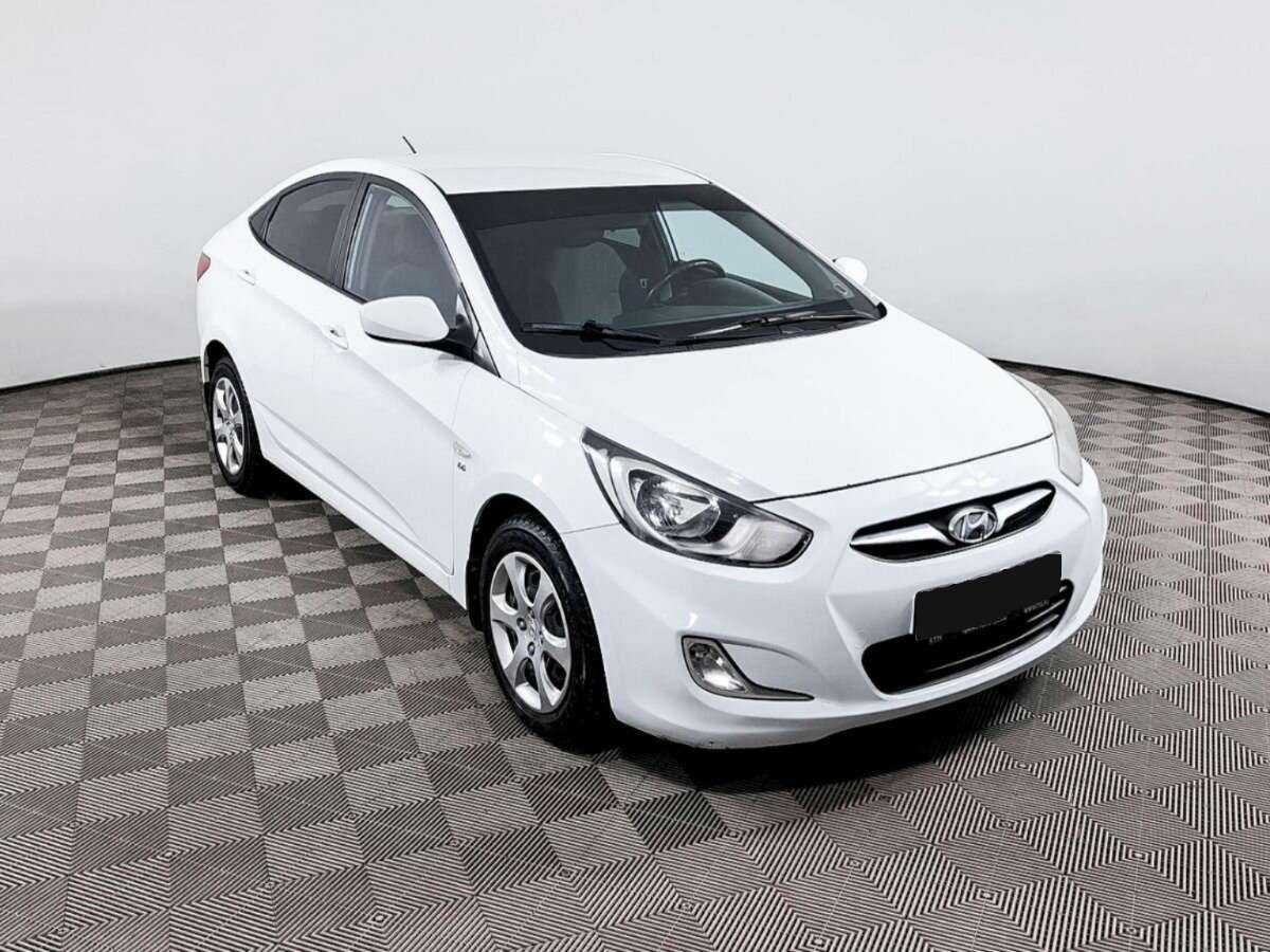 Купить Hyundai Solaris с пробегом. Фото: #2