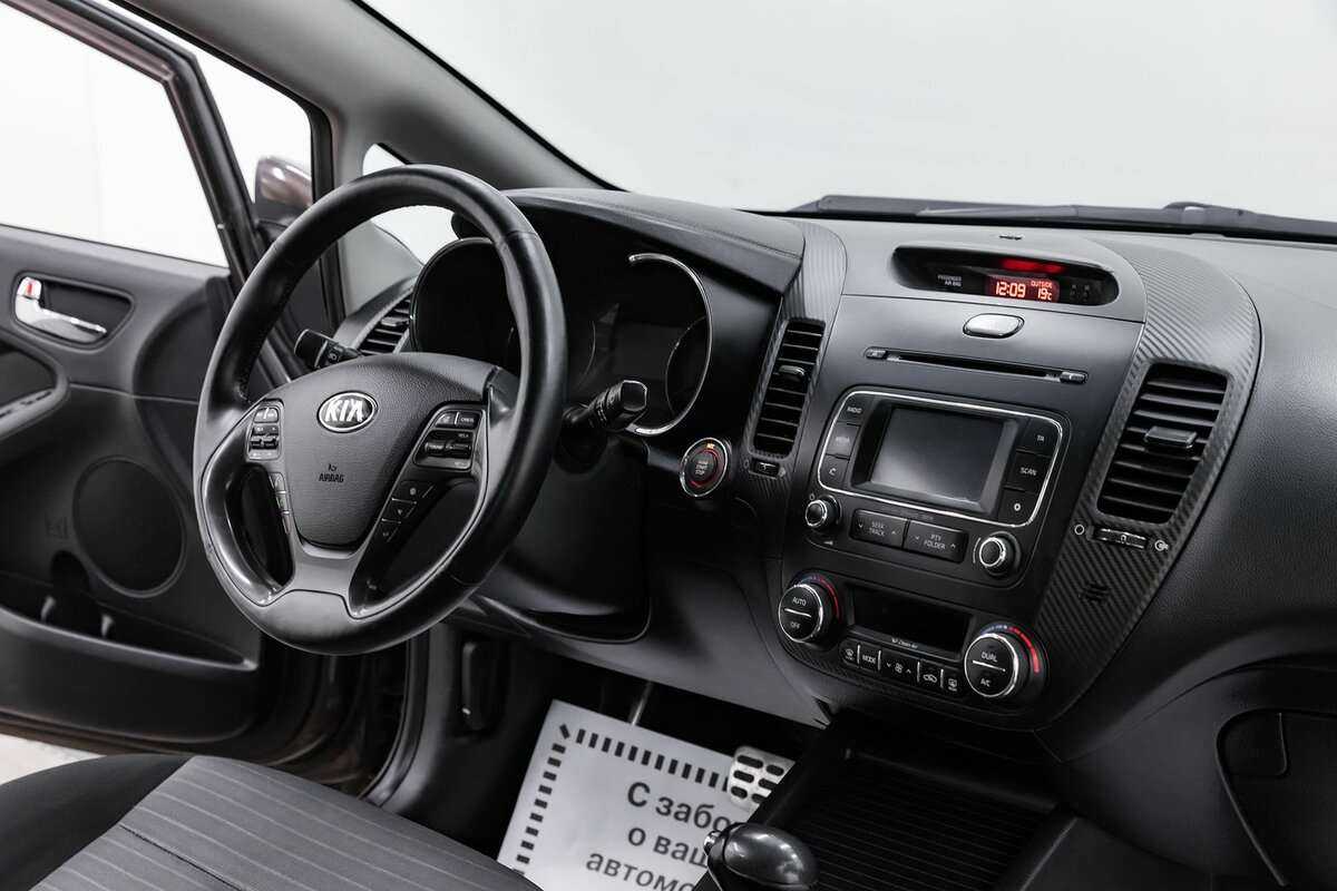 Купить Kia Cerato с пробегом. Фото: #9