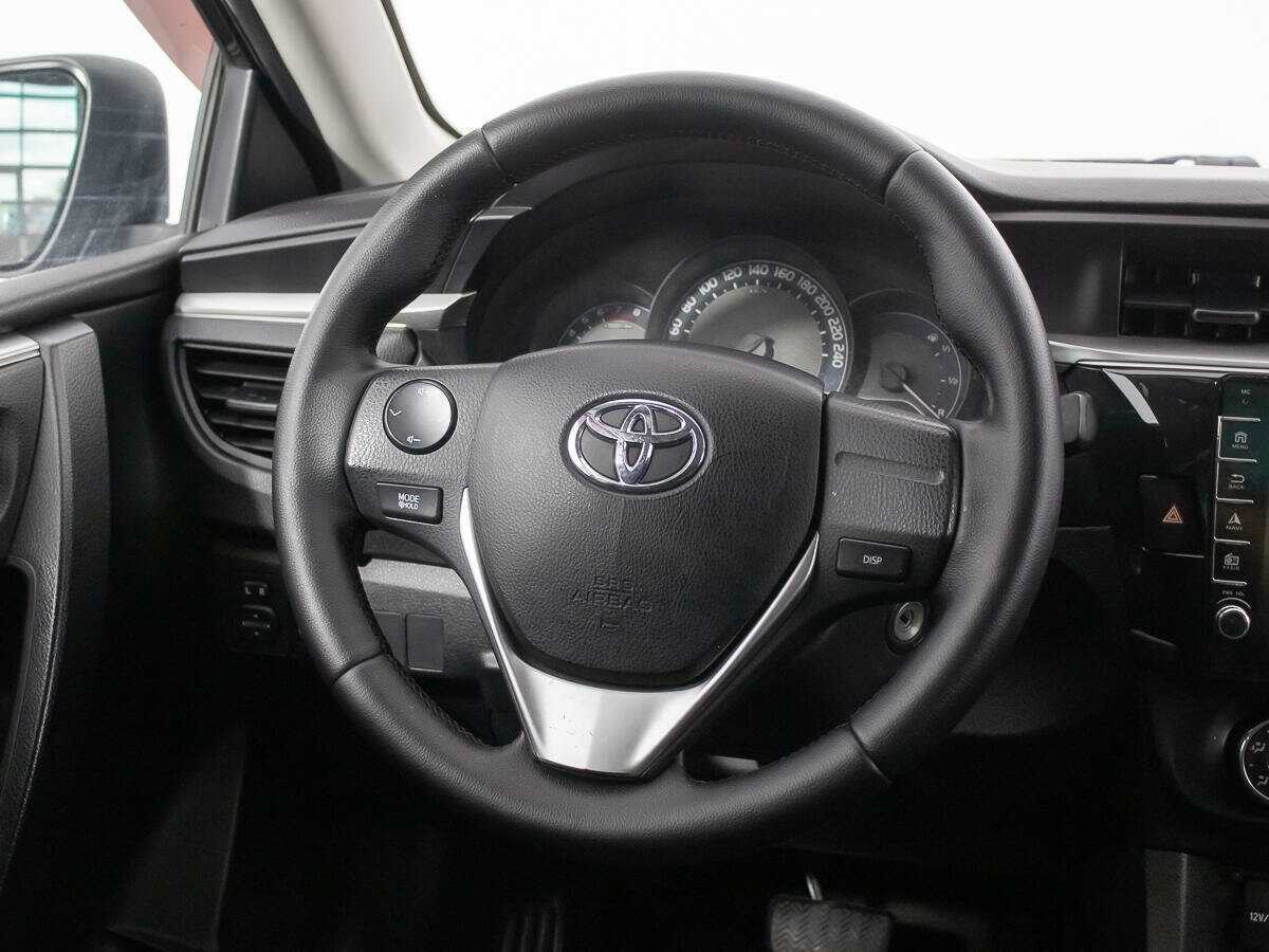 Купить Toyota Corolla с пробегом. Фото: #14