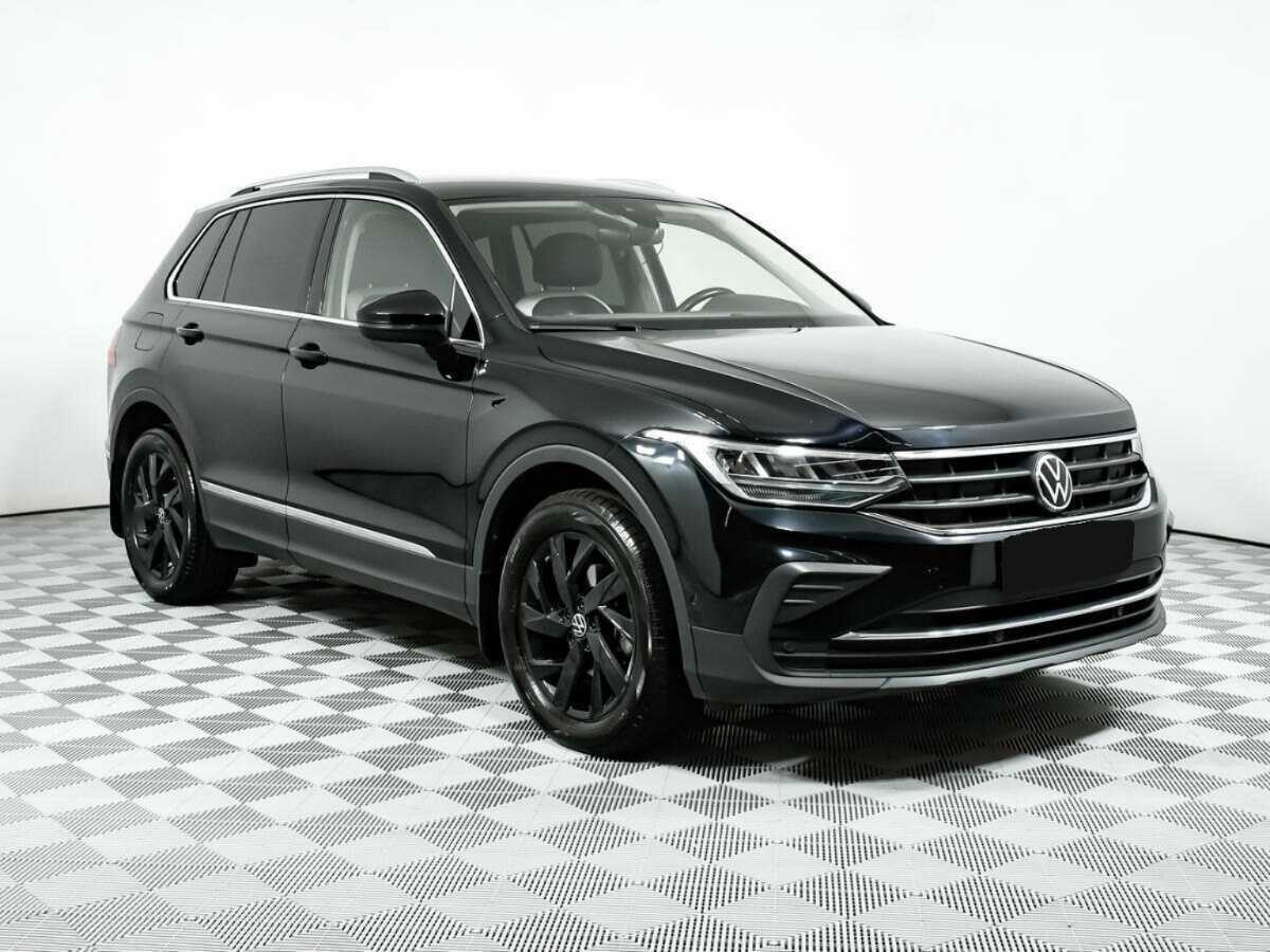 Купить Volkswagen Tiguan с пробегом. Фото: #2