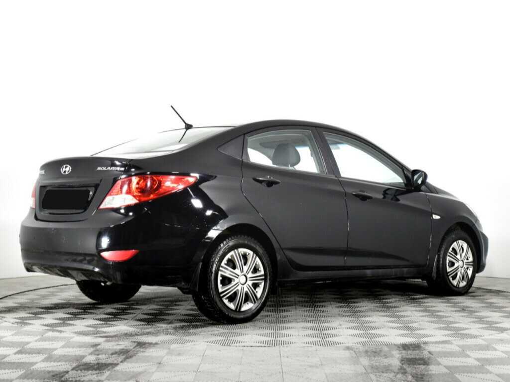 Купить Hyundai Solaris с пробегом. Фото: #2